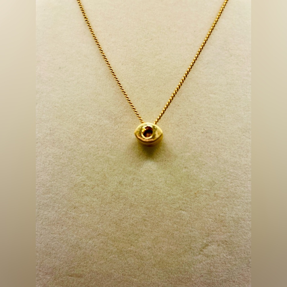 Dainty gold plated choker necklace with a cubic zirconia oval shaped pendant. - Picture 4 of 6